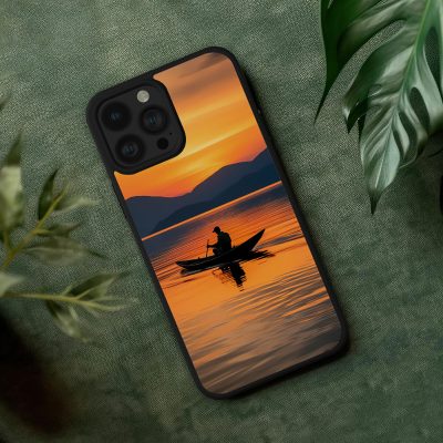 Horgász a vizen a naplementében telefontok